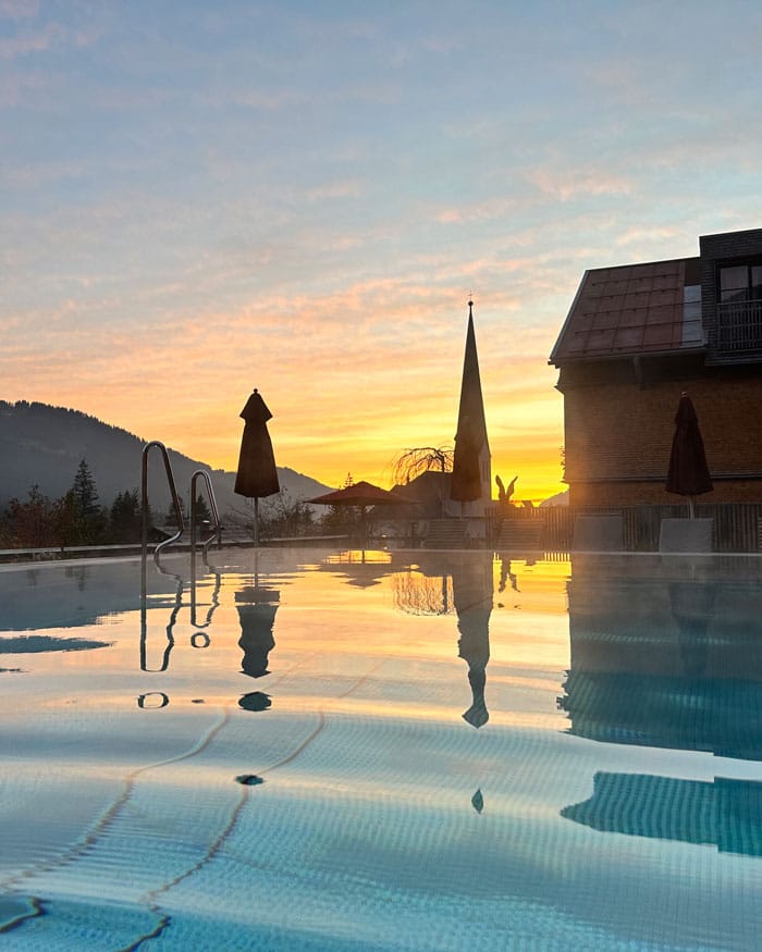 Spa Review: HUBERTUS Mountain Refugio Allgäu 16 Hubertus Spa Pool Sunset 2